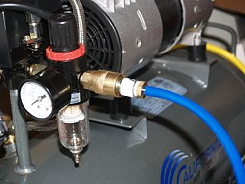 hook up air compressor to dental turbine unit for practicing for the bench test.