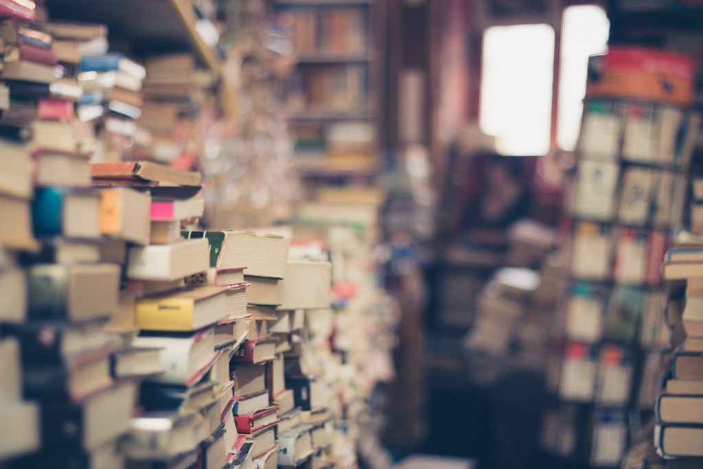 a stack of books referencing to the plethora of available study materials